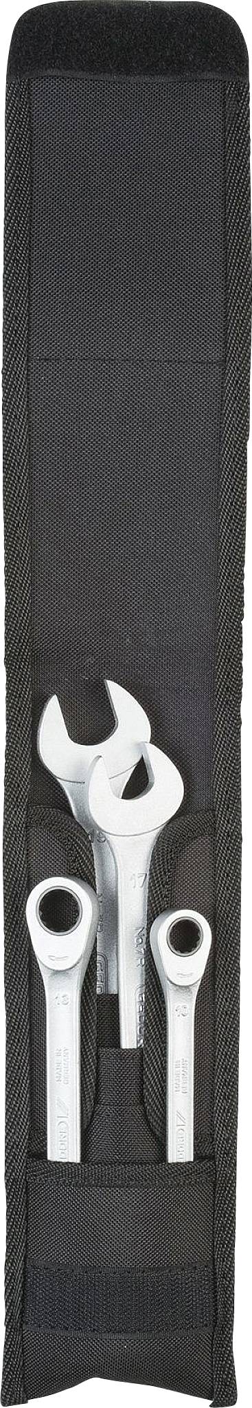 'Drei silberne Schraubenschlüssel in einer schwarzen Stofftasche.'