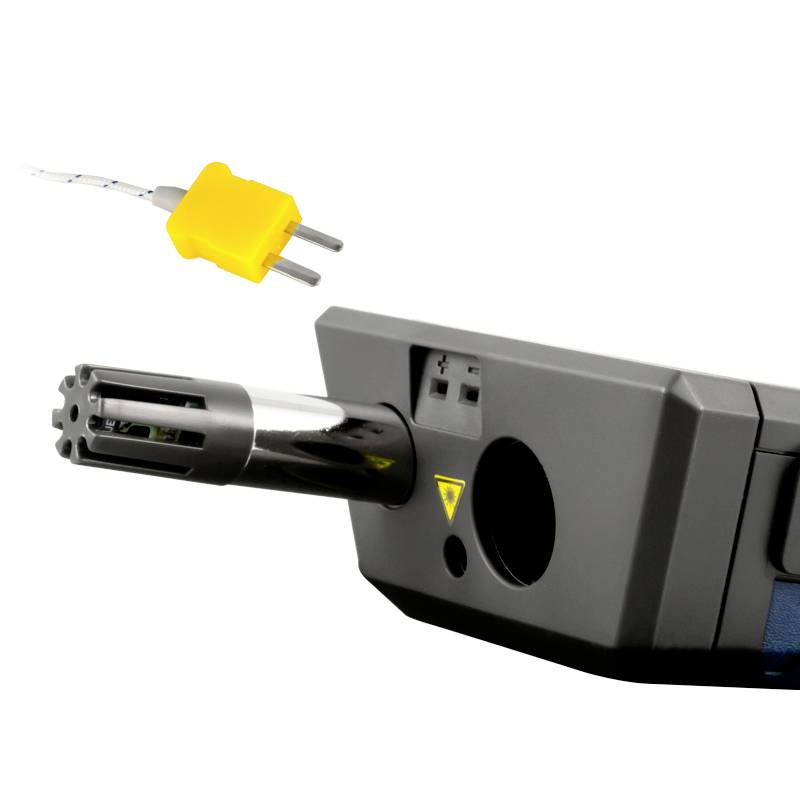 Ein schwarzes, rechteckiges elektronisches Gerät mit einem gelben Stecker an einem Kabel. Es hat mehrere Anschlüsse und Tasten.