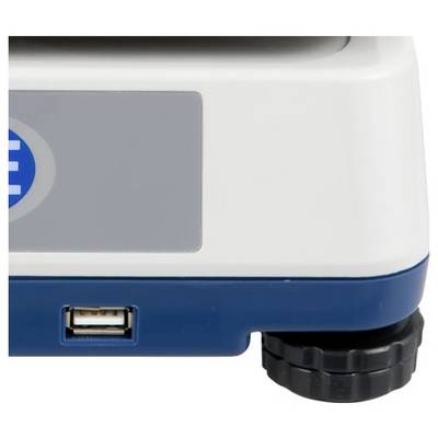 Nahaufnahme eines weiß-blauen elektronischen Geräts mit USB-Anschluss und schwarzem Gummifuß in der unteren rechten Ecke.