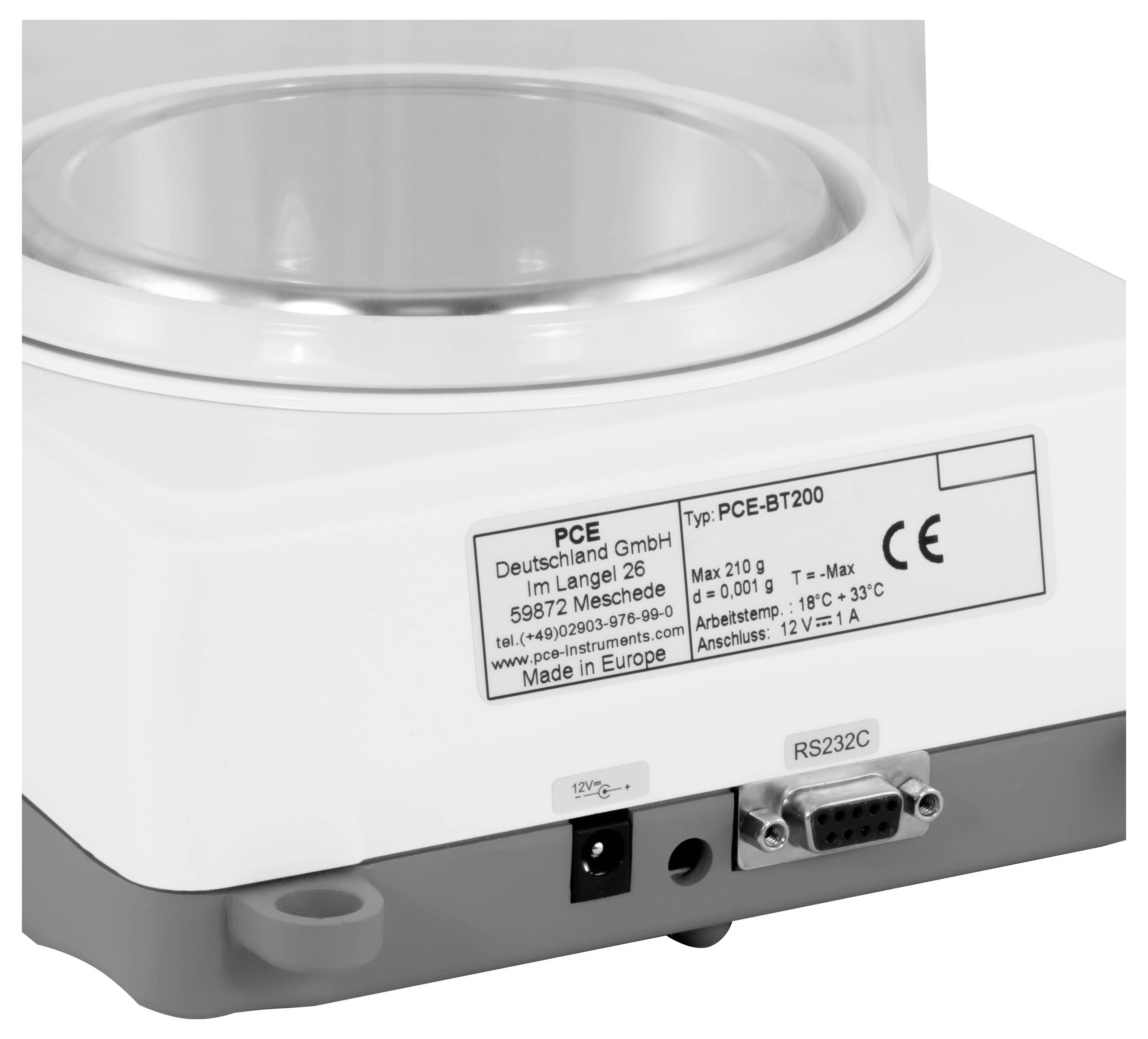 Nahaufnahme einer PCE BT200 Laborwaage mit einer Wiegeplattform, einem Stromanschluss und einem RS232C-Anschluss, die an der Basis sichtbar sind.