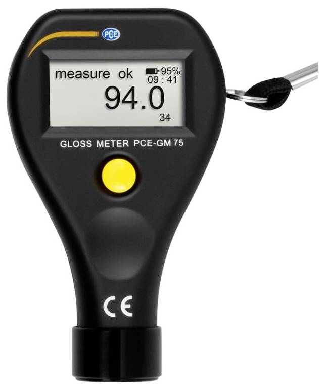 Tragbares Glanzmeßgerät mit einer Anzeige von 94,0 auf dem Display und mit angebrachtem Handgelenkband.