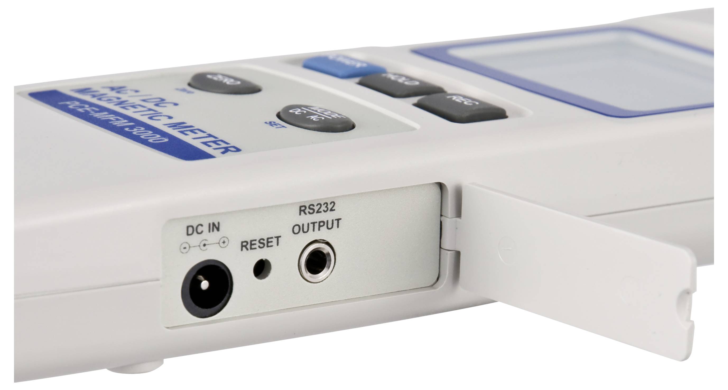 Nahaufnahme eines tragbaren elektronischen Geräts mit Stromversorgung und RS232-Ausgabeanschlüssen mit den Beschriftungen „DC IN", „RESET" und „RS232 OUTPUT".