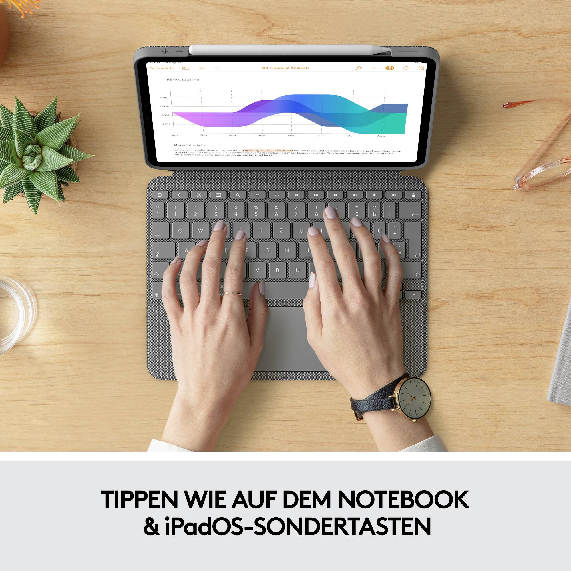 Eine Person tippt auf einer iPad-Tastatur mit einem Grafikdiagramm auf dem Bildschirm. Text unten: 'Tippen wie auf dem Notebook & iPadOS-Sondertasten'.