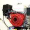 Ein roter Honda GX Motor montiert auf einer Maschine. Der Motor ist neu und glänzend mit sichtbaren Zündkerzen und Komponenten.
