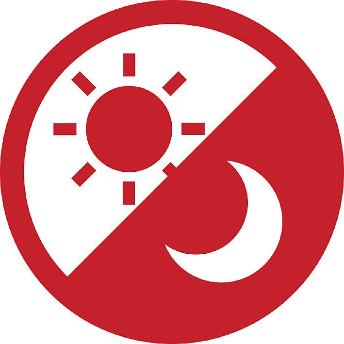 Ein roter Kreis mit einem Sonnensymbol auf der linken oberen Hälfte und einem Mondsymbol auf der rechten unteren Hälfte.