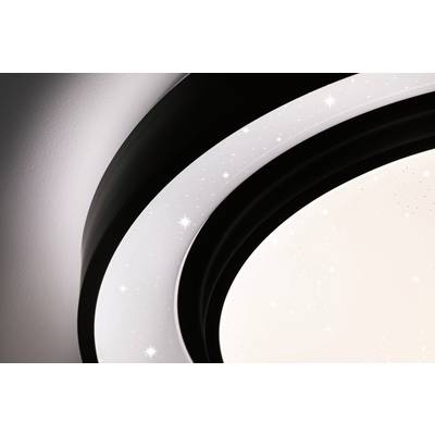 Eine moderne Deckenleuchte mit sternenklarem Design, strahlt sanftes Licht aus. Die Oberfläche imitiert einen funkelnden Nachthimmel.