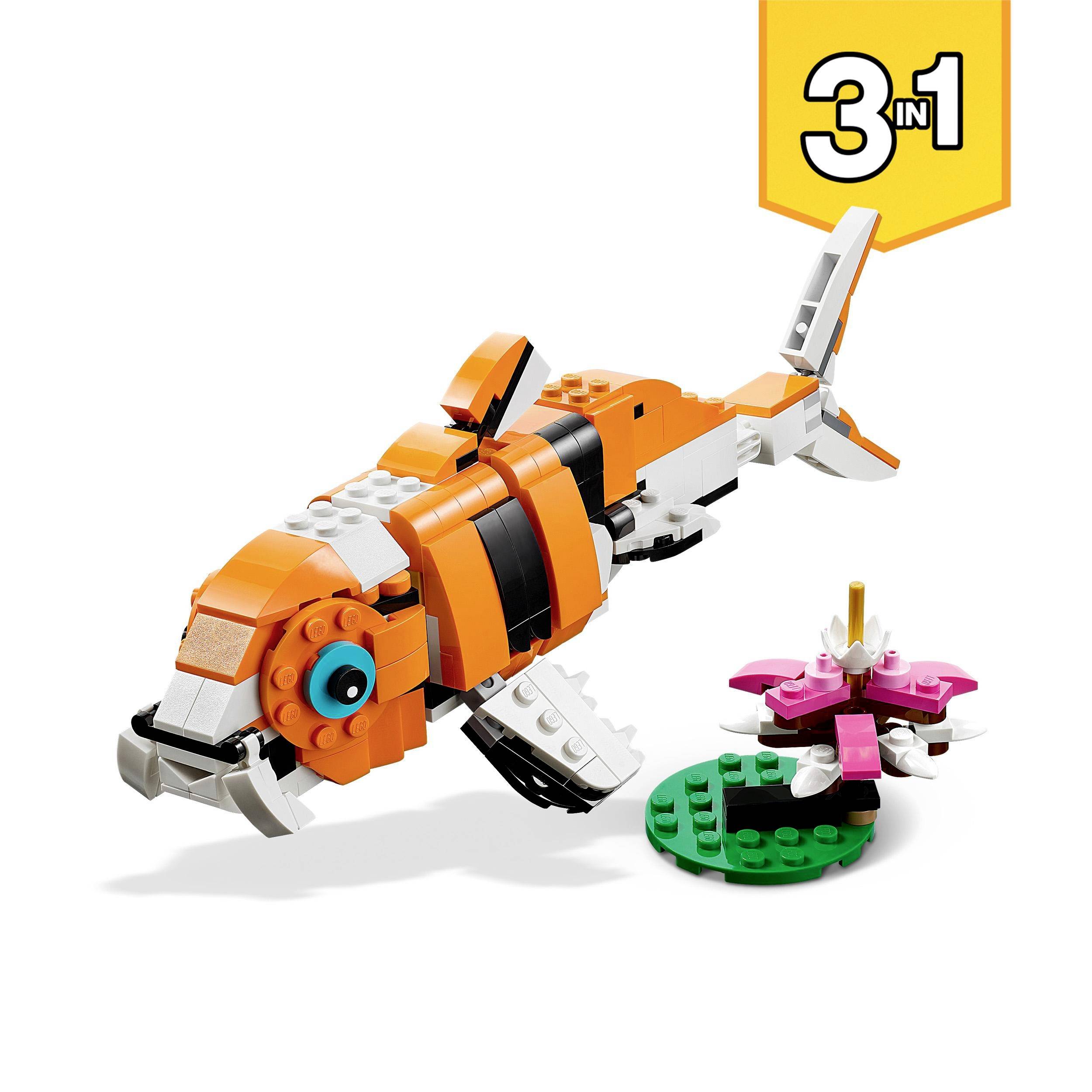 Ein LEGO-Set zeigt einen Koi-Fisch mit orange-weißen Flossen, daneben eine kleine rosa-weiße Wasserlilie. '3 in 1' steht in der Ecke.
