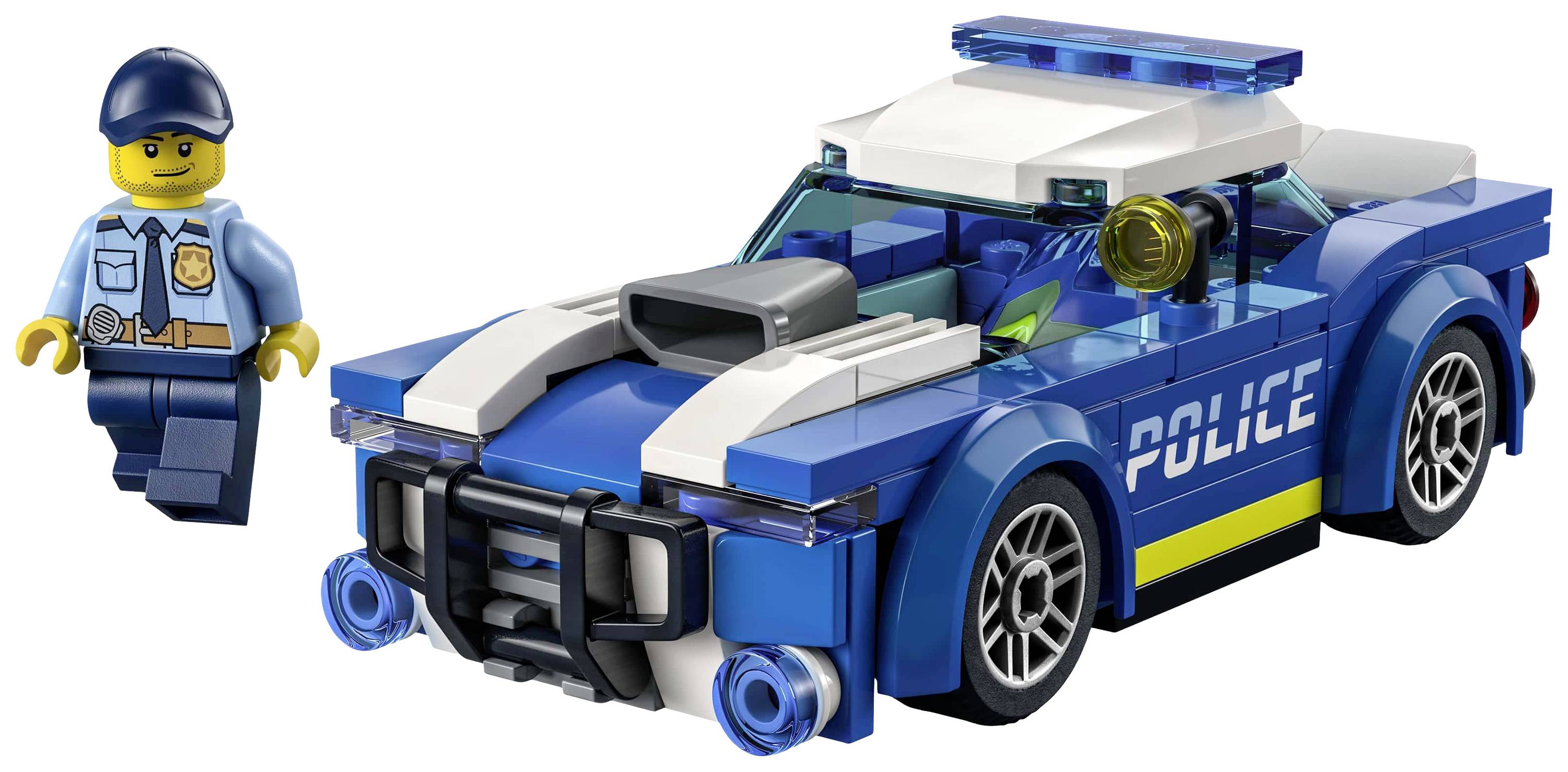 Spielzeug-Polizeiauto aus LEGO-Steinen mit Polizist-Figur in Uniform. Das Auto ist blau-weiß mit 'Police' Schriftzug.
