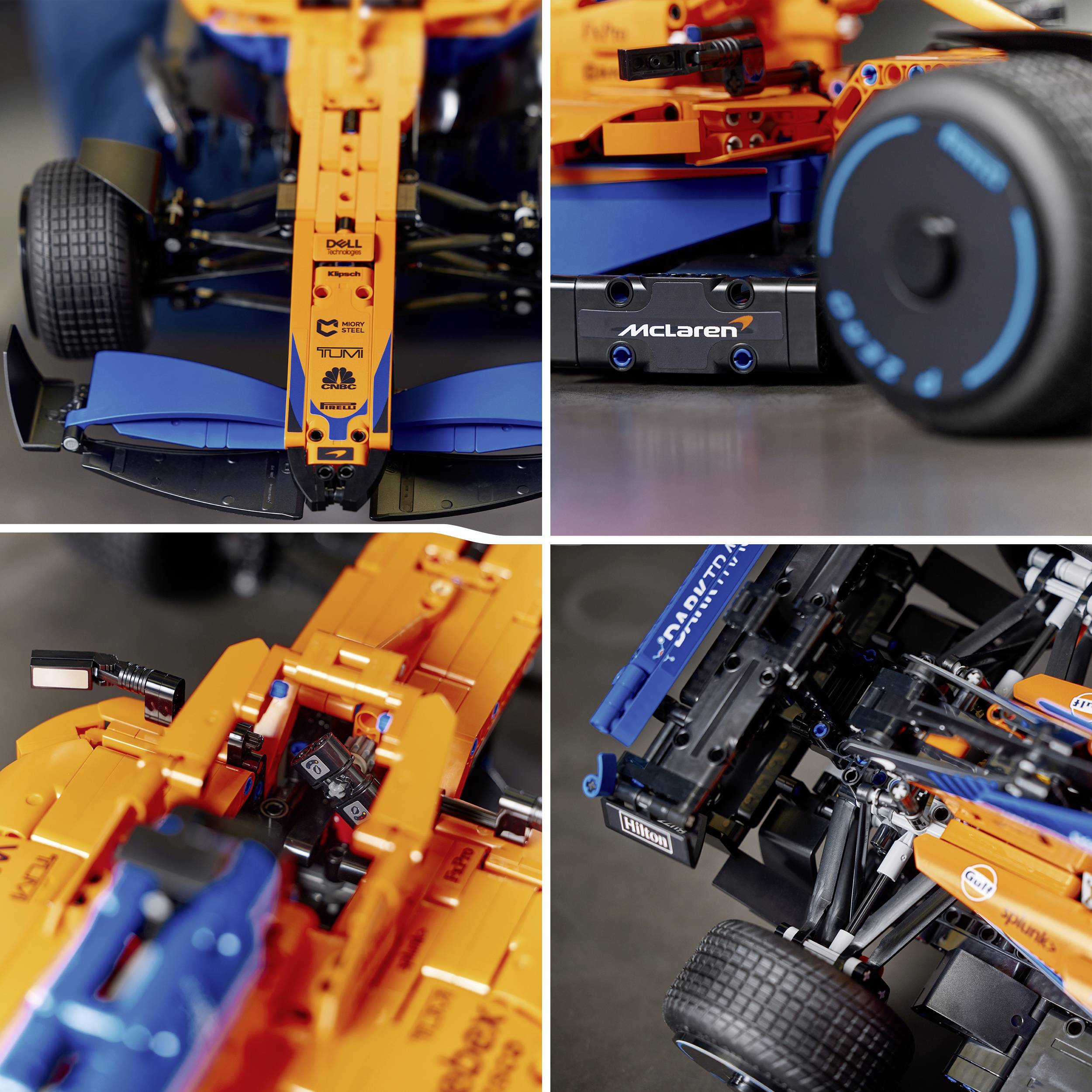 Nahaufnahme eines detaillierten Modells eines Formel-1-Rennwagens aus Lego. Sichtbare Markenlogos und technische Details der Konstruktion.
