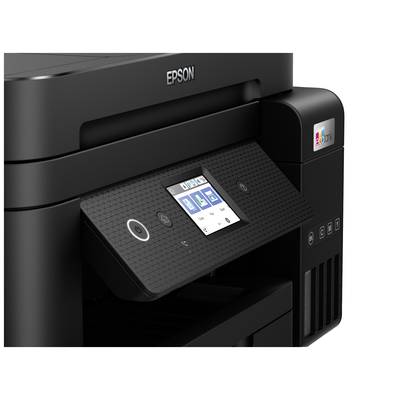 Multifunktionsdrucker mit schrägem Bedienfeld, Display zeigt Symbole für Kopie, Druck und Scan. Marke im oberen Bereich sichtbar.