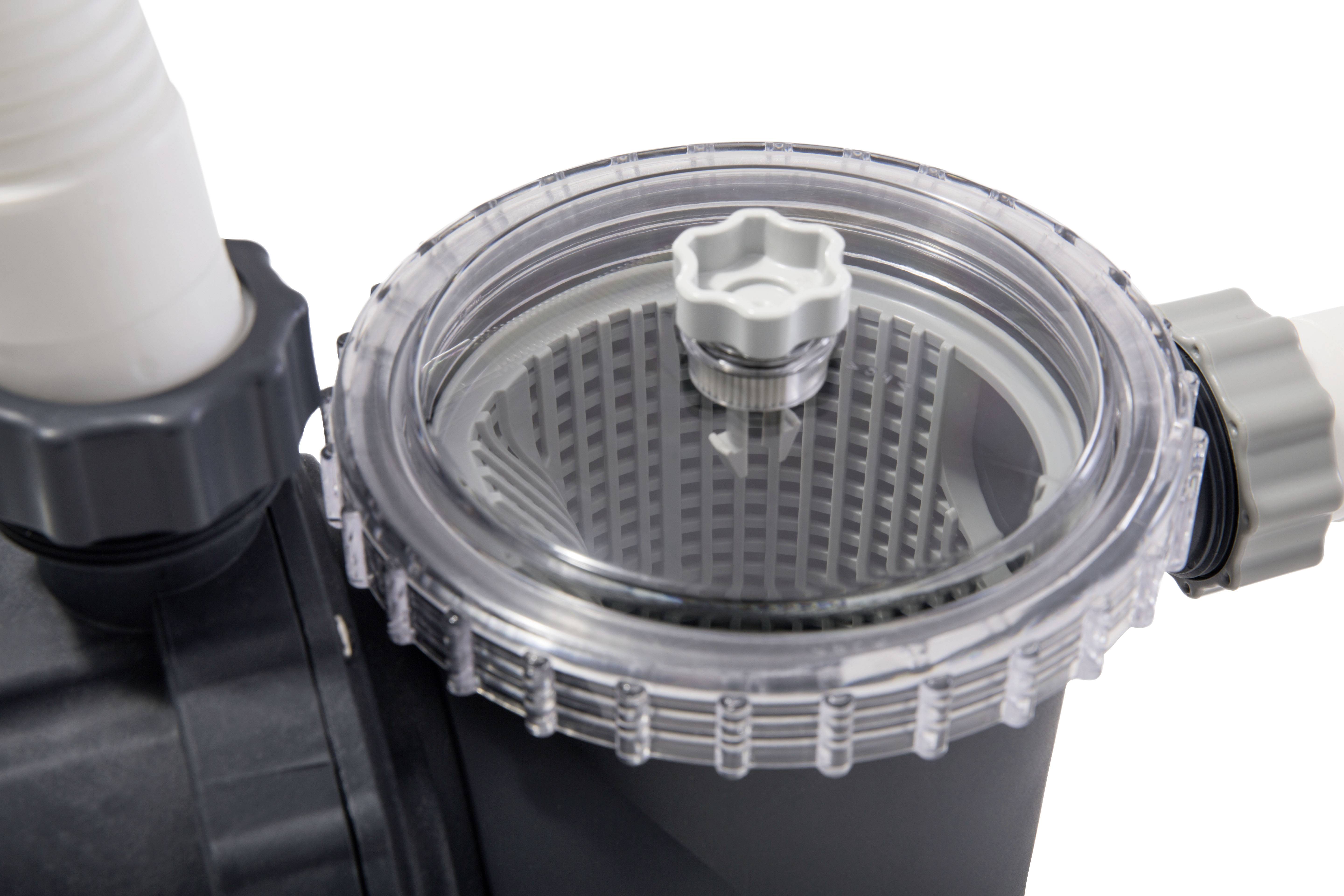 Eine Poolpumpe mit transparentem Deckel zeigt das Innere des Filters an, ermöglicht die visuelle Überprüfung der Wasserqualität.