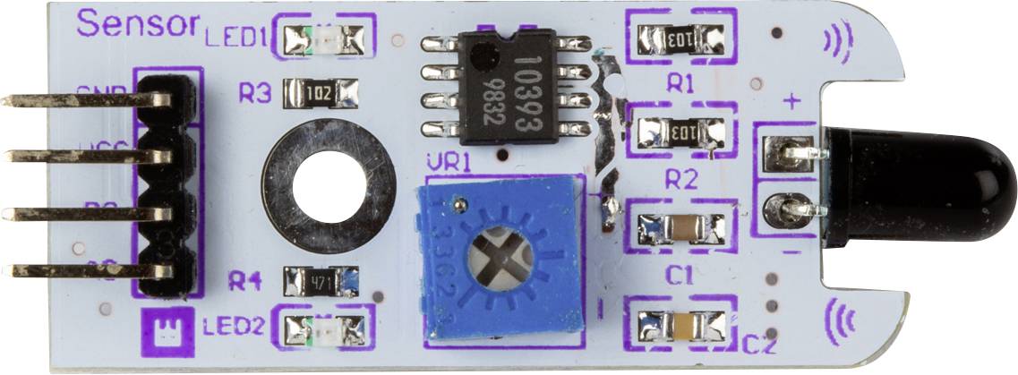 Ein Lichtabtastsensor-Modul mit mehreren Widerständen, LEDs und einem IC-Chip auf einer kleinen, rechteckigen Leiterplatte.