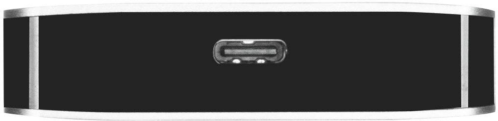 Eine schwarze, rechteckige elektronische Box mit einem USB-C-Anschluss in der Mitte der Vorderseite, ohne sichtbare Beschriftungen.