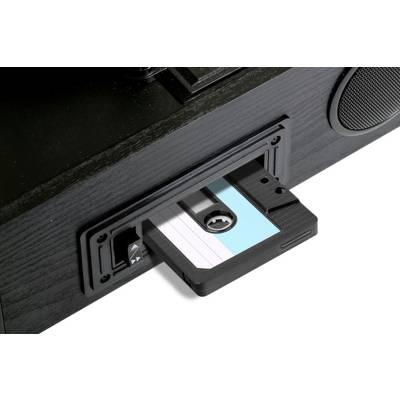 Eine schwarze Kassette wird in ein Aufnahmegerät eingeführt.