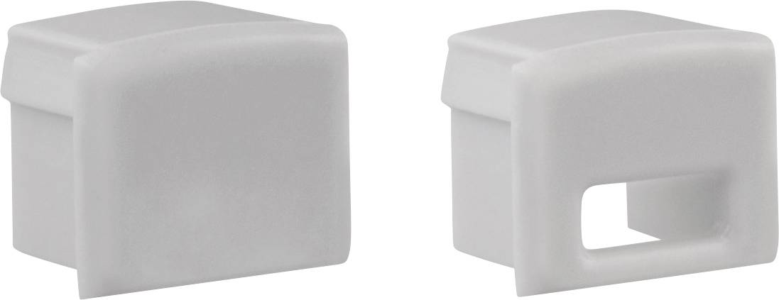 Zwei Ansichten eines grauen Kunststoff-Stecker- oder Abdeckungselements in Würfelform, wobei eine Seite glatt ist und die andere Seite eine rechteckige Aussparung aufweist.