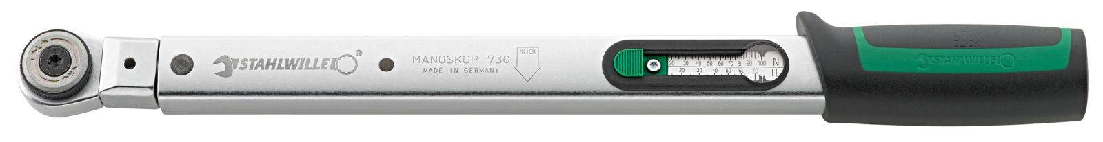 Drehmomentschlüssel mit Anzeige für Drehmomenteinstellung, Metallkörper und schwarzem, grün akzentuiertem Griff auf weißem Hintergrund.