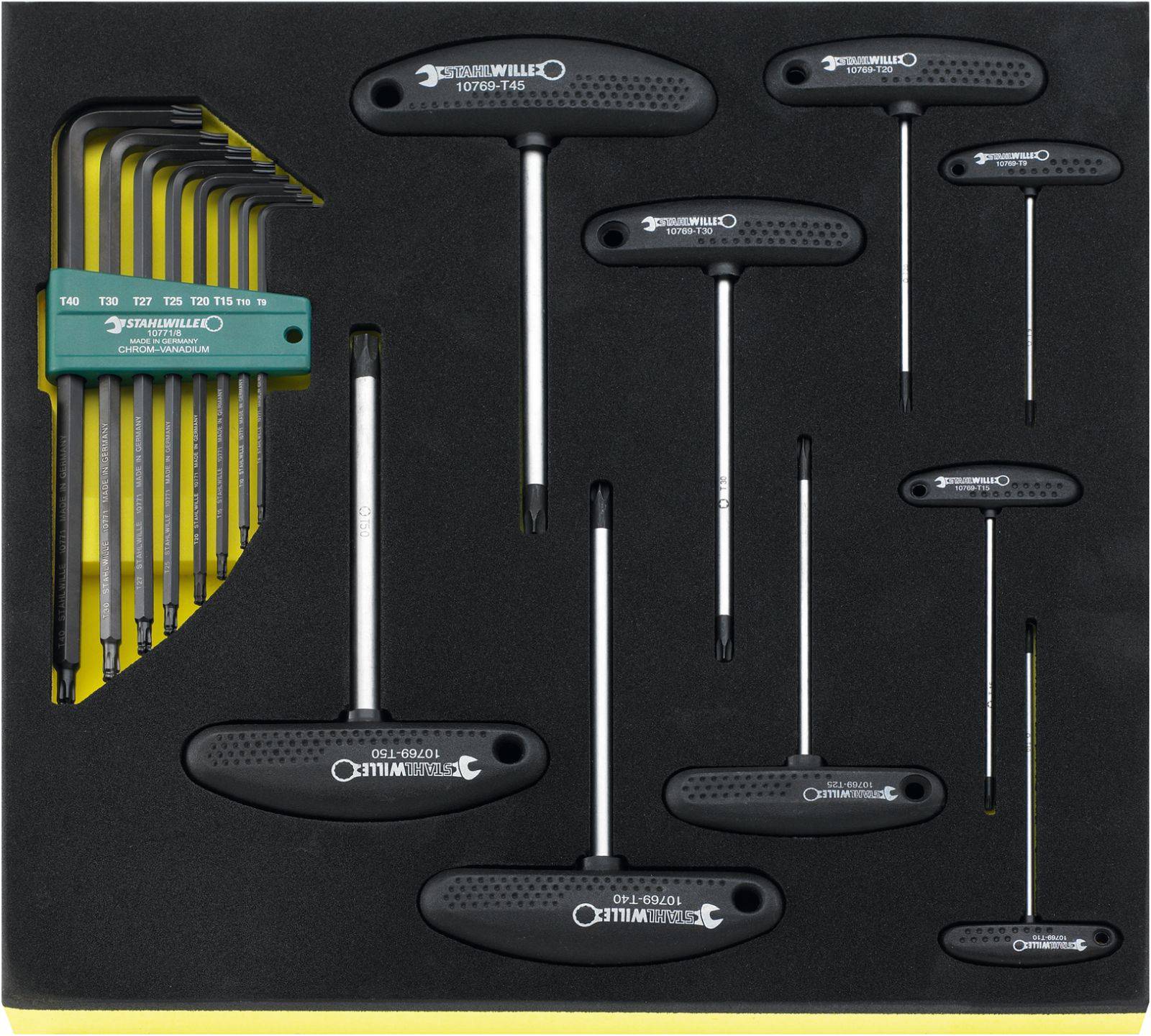 Eine Sammlung von T-Griff-Sechskantschlüsseln in verschiedenen Größen, ordentlich in Schaumstoff eingelegt, neben L-förmigen Sechskantschlüsseln.