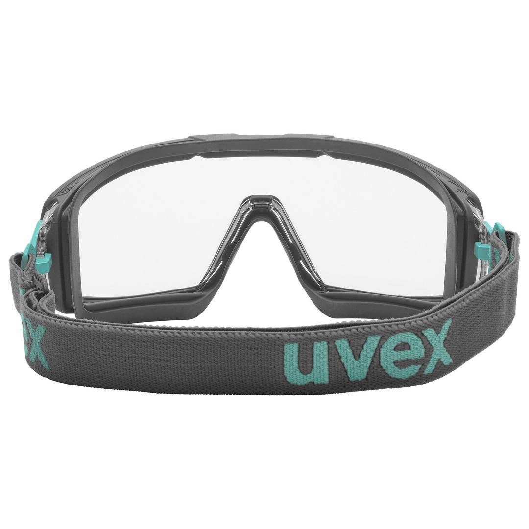 Schutzbrille mit klarem Glas und flexiblem, schwarzem Band mit grünem 'uvex' Logo, geeignet für Sicherheitsanwendungen.