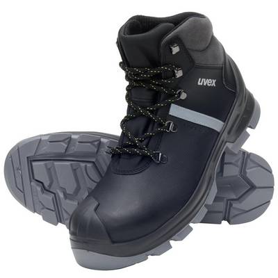 Schwarze Sicherheitsschuhe mit dicker Profilsohle, Schnürsenkel und verstärkter Zehenkappe, geeignet für Baustellen und Werkstätten.