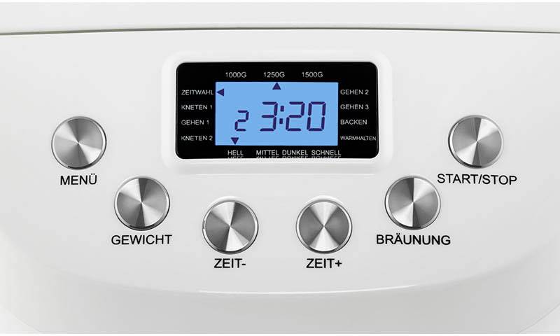 Bild eines Brotbackautomaten mit digitalem Display. Knöpfe für Menü, Gewicht, Zeit- und Bräunungseinstellung. Display zeigt '3:20'.