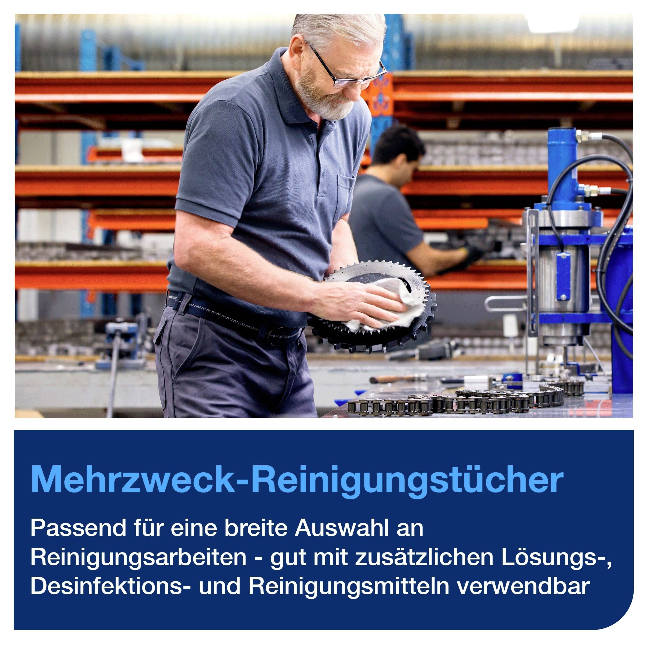 Ein Mann in Arbeitskleidung bedient eine Maschine in einer Werkstatt. Text: 'Mehrzweck-Reinigungstücher. Passend für viele Reinigungsarbeiten.'