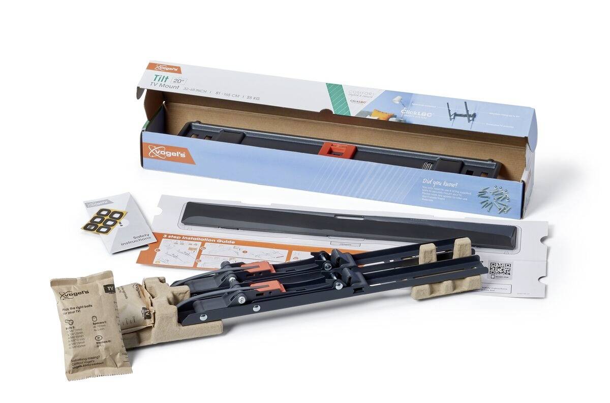 Laptop-Halterung in geöffneter Verpackung. Enthält Laptop-Ständer, Verpackungselemente und kleine Zubehörteile.