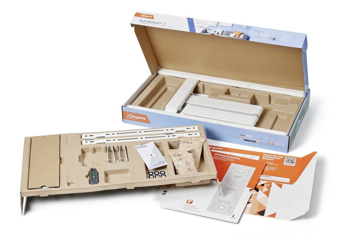 Ein geöffnetes Verpackungskit mit Montagewerkzeugen, Anleitungen und Zubehör für die Installation eines Regalsystems.