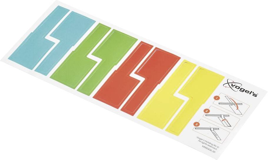 Buntes Set von selbstklebenden Kabelabdeckungen in Blau, Grün, Rot und Gelb, zur ordentlichen Führung von Kabeln.