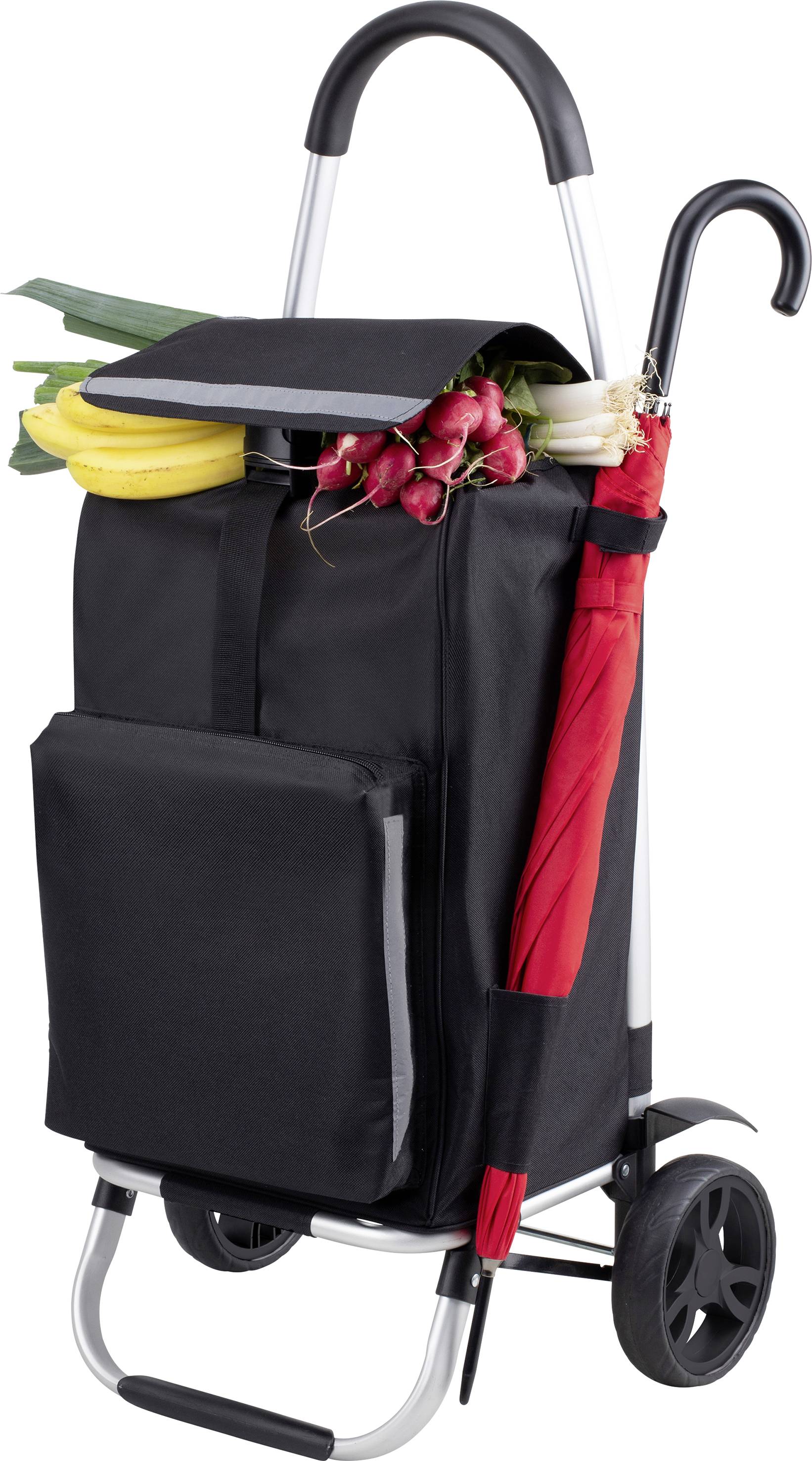 Ein schwarzer Einkaufstrolley mit Bananen, Radieschen und einem roten Regenschirm im Seitenfach, auf zwei Rädern mit Griff.
