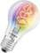 Glühbirne mit Regenbogenverlauf und spiralförmigem, leuchtendem Filament, beschriftet mit 'LEDVANCE'.