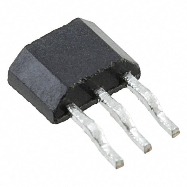 Ein schwarzer, dreibeiniger Transistor liegt auf einer weißen Oberfläche.