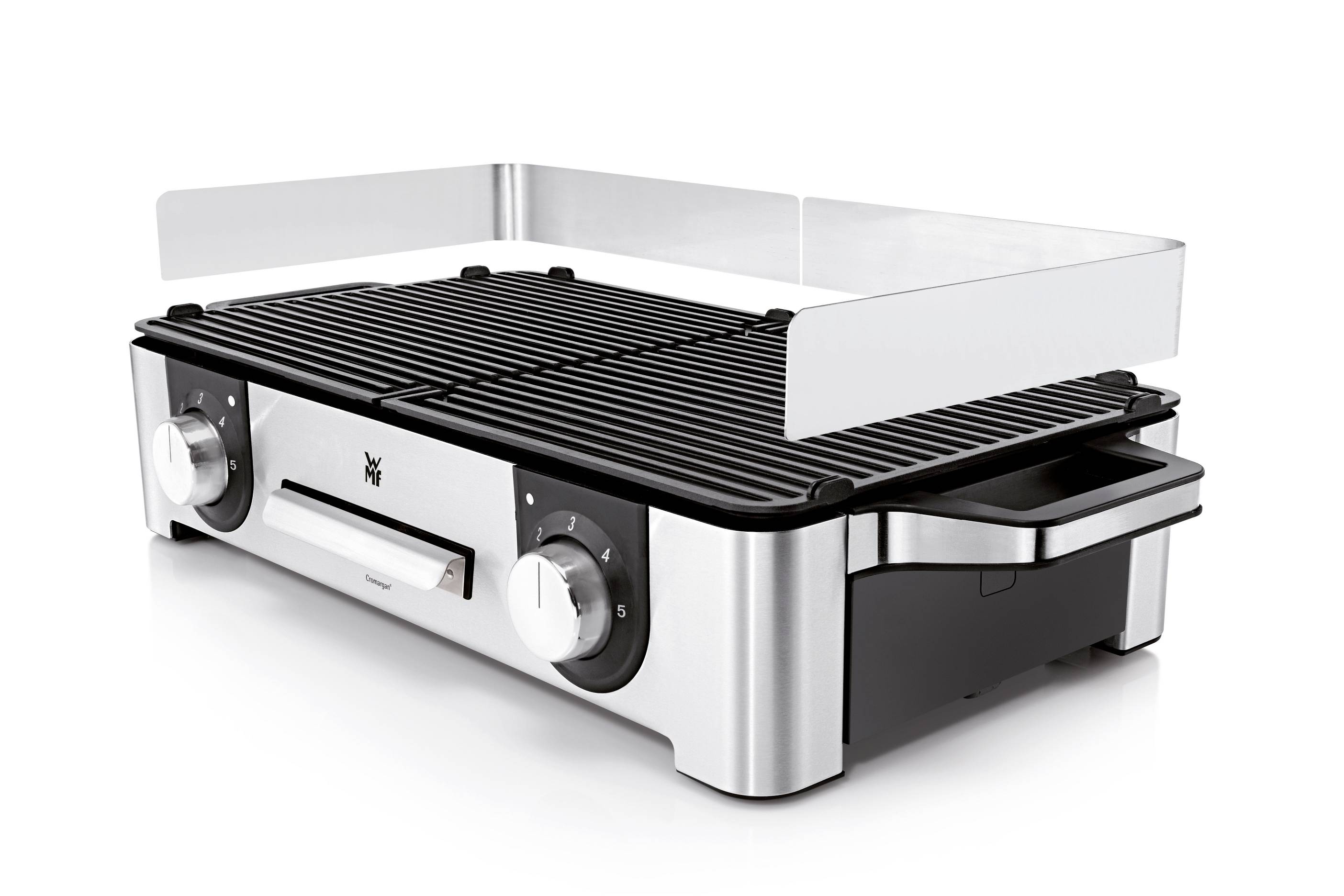 Ein elektrischer Tischgrill aus Edelstahl mit zwei Heizplatten und Temperaturreglern, geeignet für vielseitiges Grillen im Innenbereich.