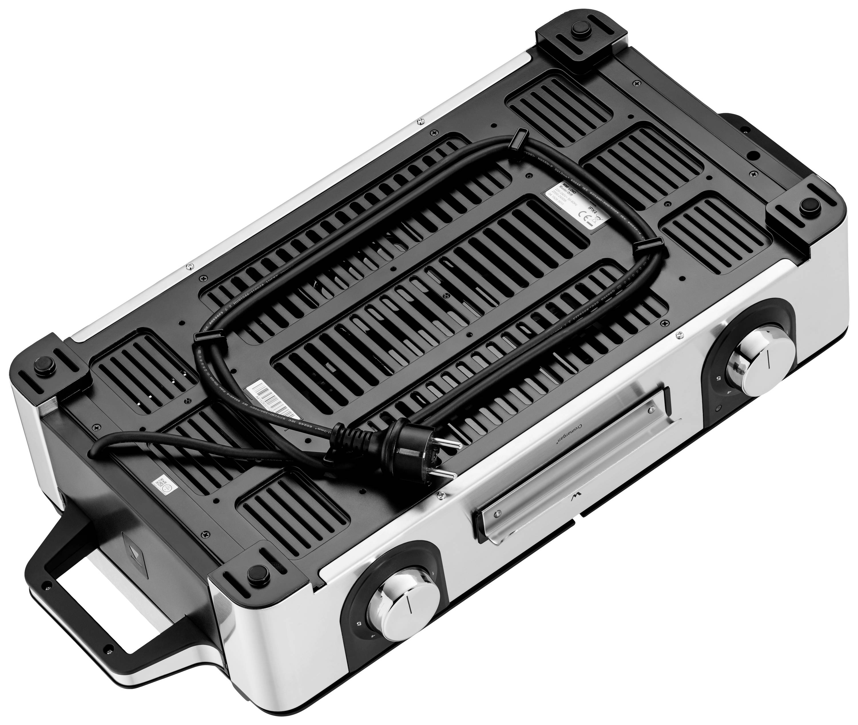 Tragbarer Grill mit integriertem Griff und Kabel, liegend auf einer Oberfläche, zeigt die Unterseite mit Belüftungsschlitzen.