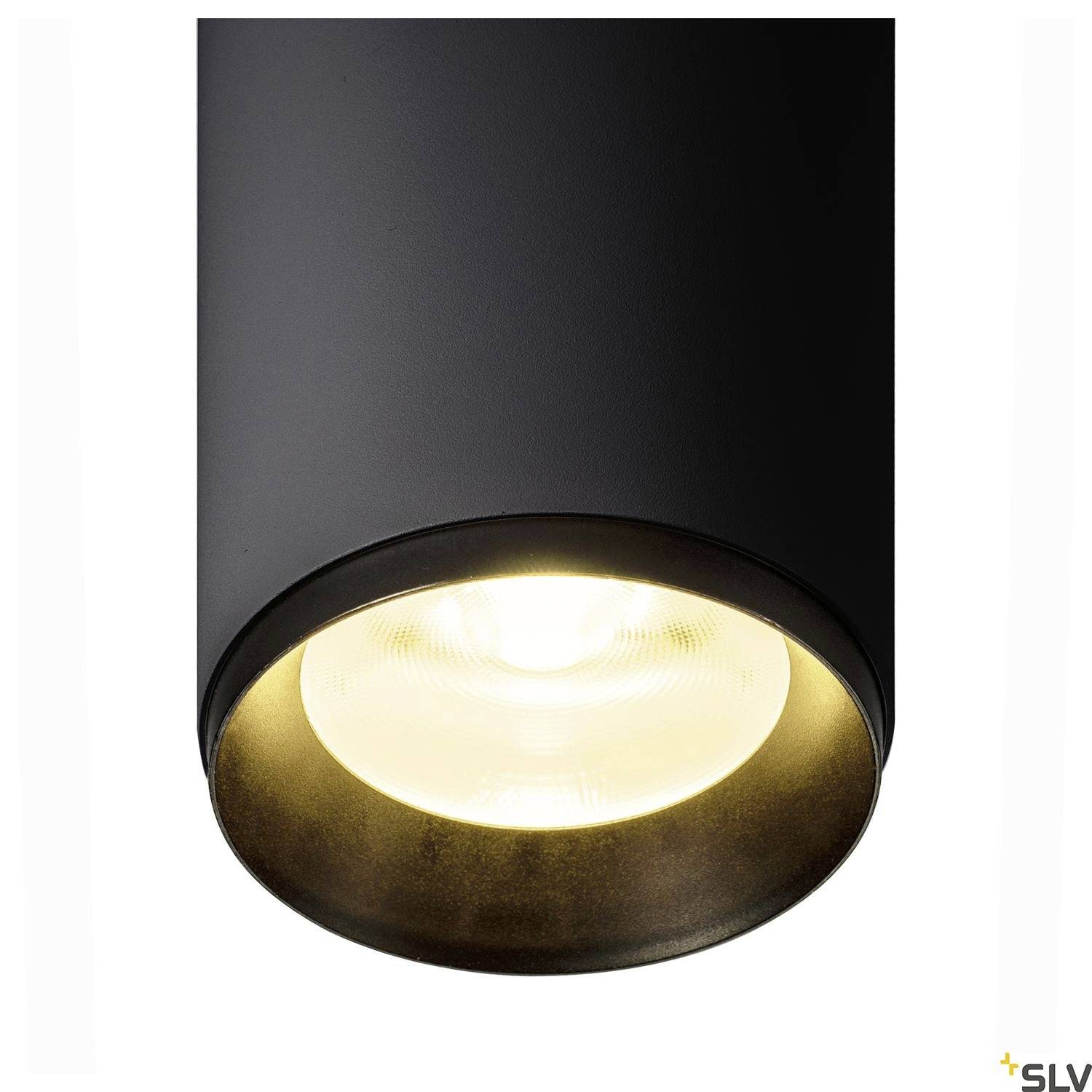 Schwarzes zylindrisches Deckenlicht mit einer sichtbaren Leuchtfläche, die weiches, diffuses Licht abgibt. Ideal für moderne Raumgestaltung.