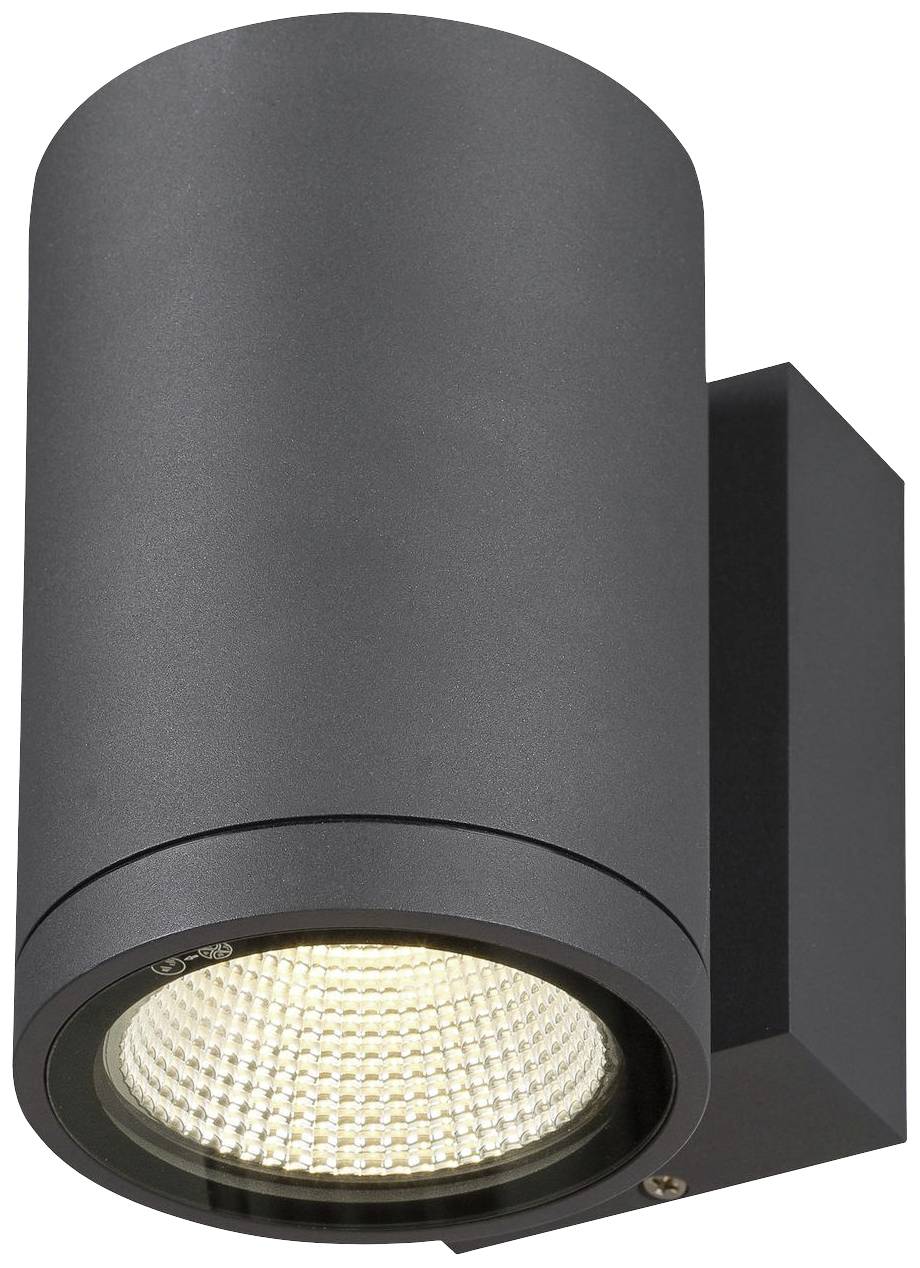 Eine moderne, zylinderförmige Außenleuchte mit einem warmen LED-Licht, die an einer Wand montiert ist. Ideal für Außenbereiche.