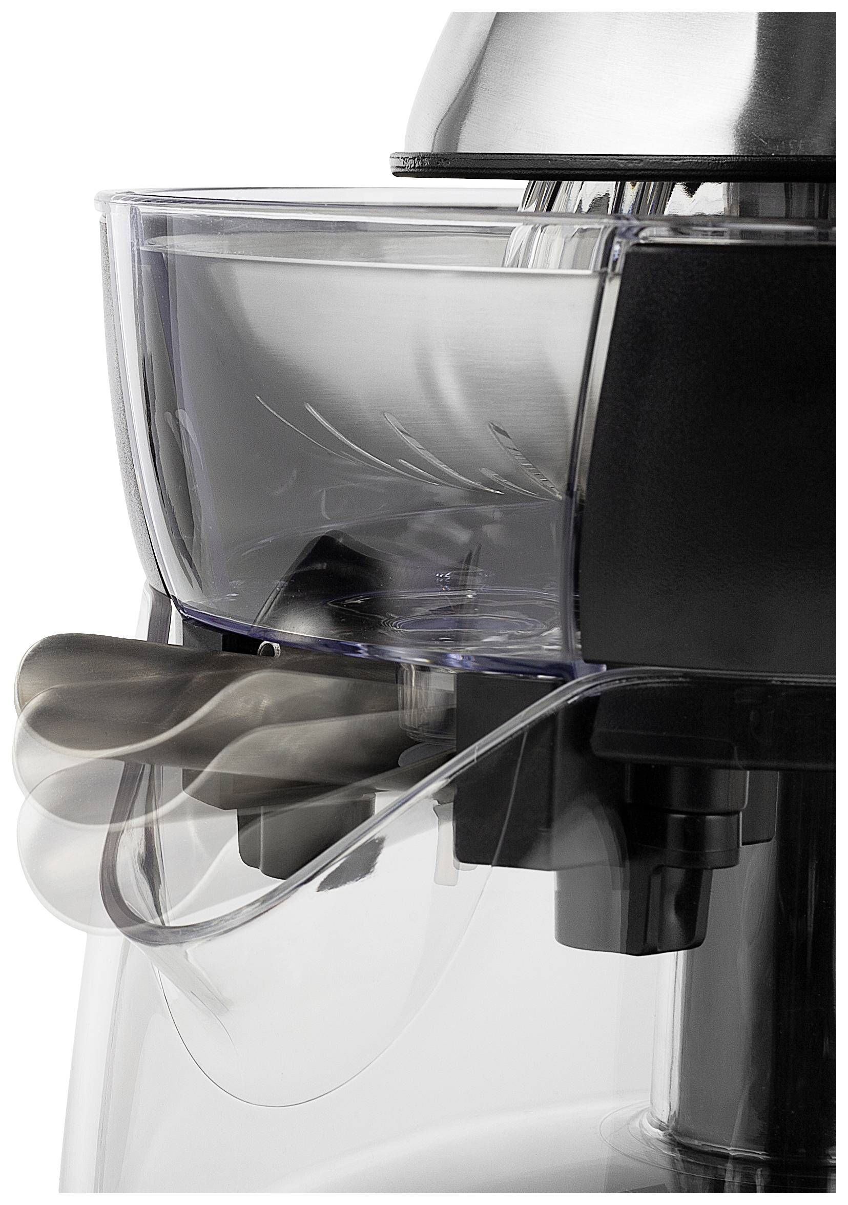 Ein Entsafter mit durchsichtigem Behälter und silbernen Metallteilen, bereit für den Gebrauch.