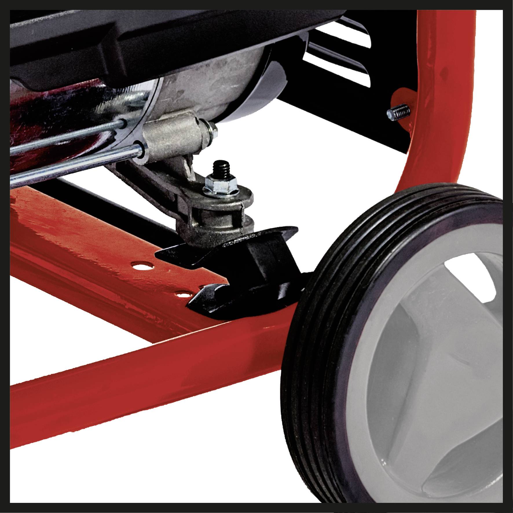 Ein rotes Gestell mit einem Rad und einer Metallhalterung, Teil einer größeren Maschine. Die Oberfläche ist glänzend und robust.