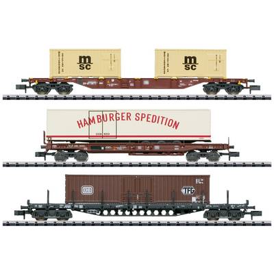 'Drei Modellbahn-Güterwaggons übereinander: oben MSC Container, Mitte 'Hamburger Spedition' Container, unten DB Container.'