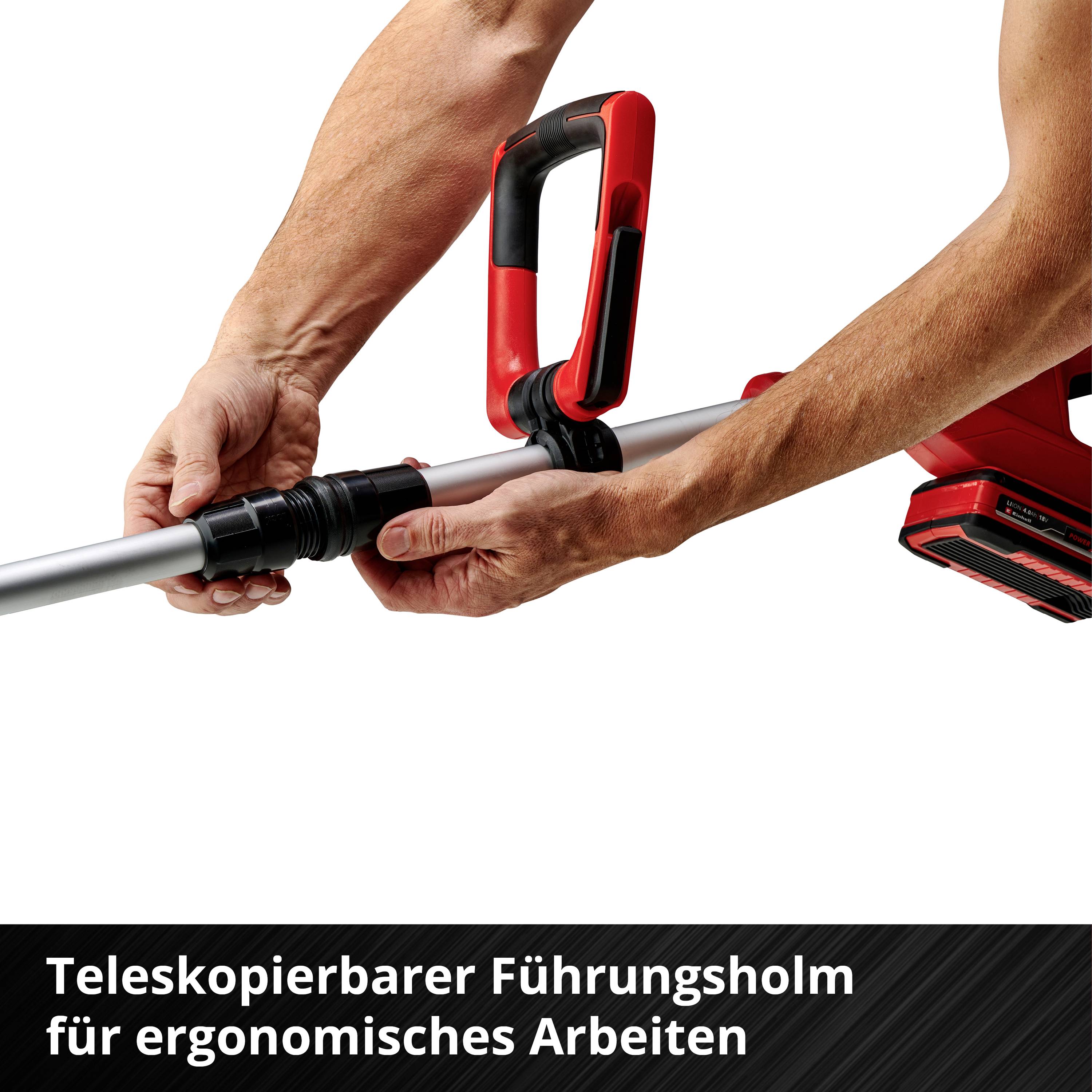 'Ein Mann hält einen roten Teleskopierbarer Führungsholm für ergonomisches Arbeiten.'