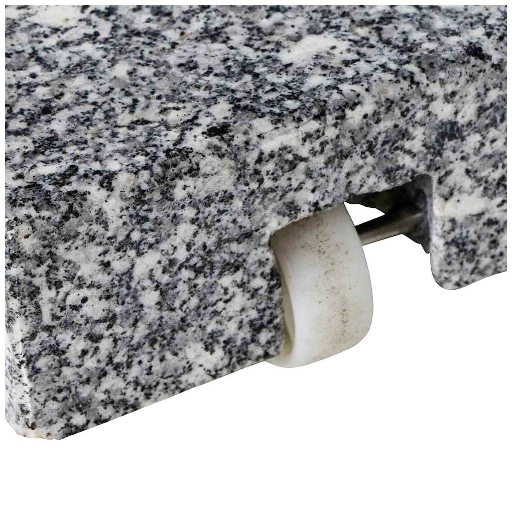 Eine Granitplatte mit eingebautem Rad, geeignet für bewegliche Anwendungen oder Möbel. Die Textur zeigt typische graue und weiße Muster.