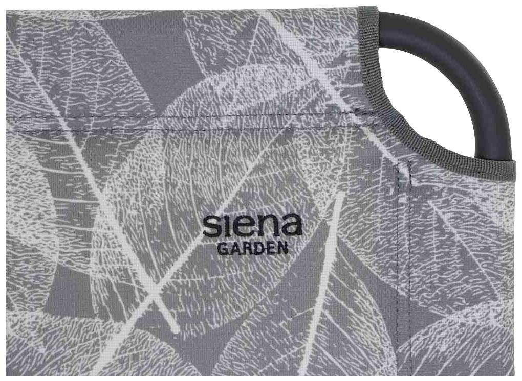 Grauer Stoff mit weißen Blättermustern, Aufschrift 'Siena Garden' sichtbar, darunter ein schwarzer Griff rechts.