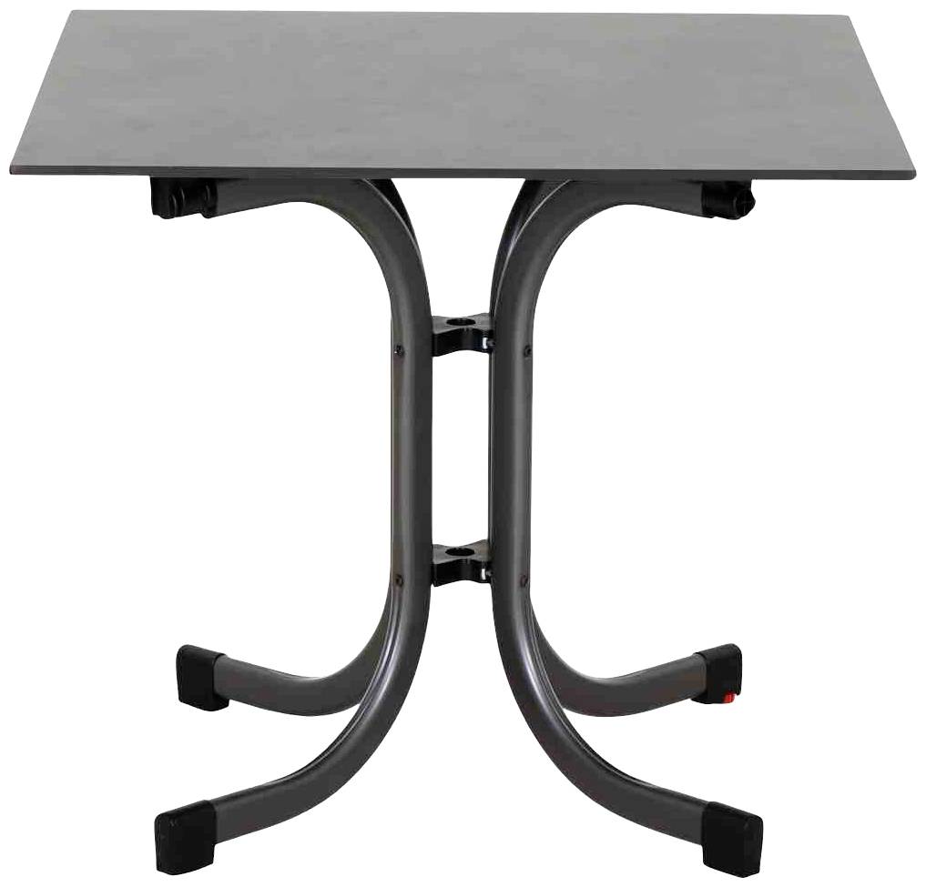 'Minimalistischer Tisch mit Metallbeinen und rechteckiger, dunkler Oberfläche.'