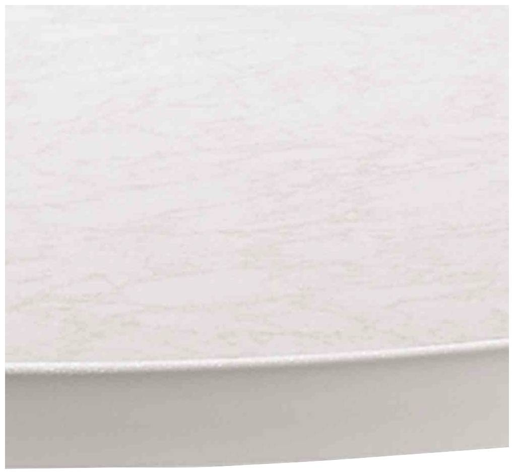 Ein Ausschnitt einer runden, weißen Oberfläche mit feiner Textur.