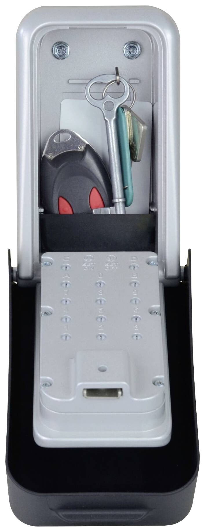 Ein geöffneter Schlüsseltresor mit Schlüssel und Fernbedienung im Inneren.