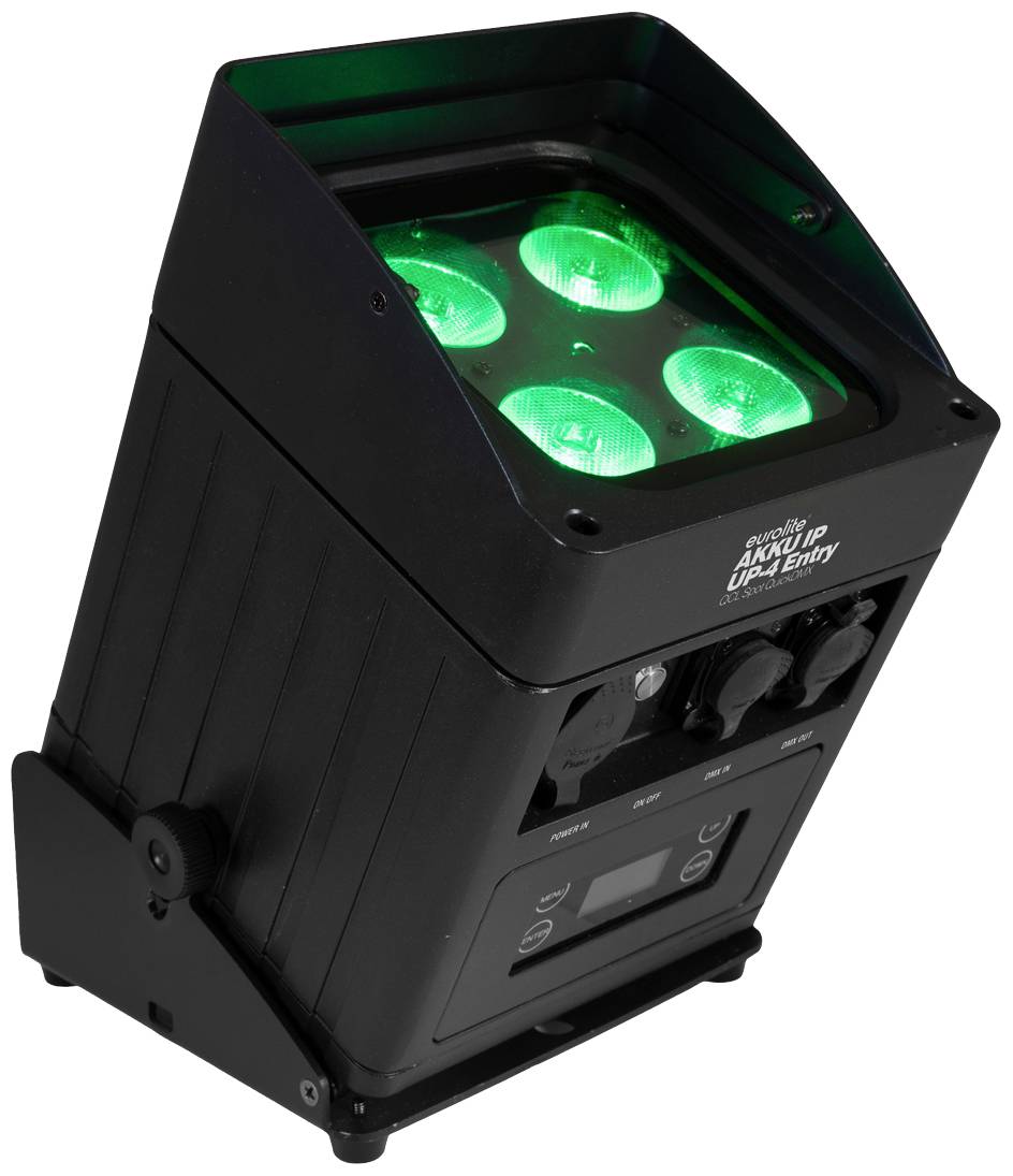 Ein schwarzer LED-Scheinwerfer, der grünes Licht ausstrahlt, mit Bedienungselementen an der Vorderseite, geeignet für Bühnenbeleuchtung.