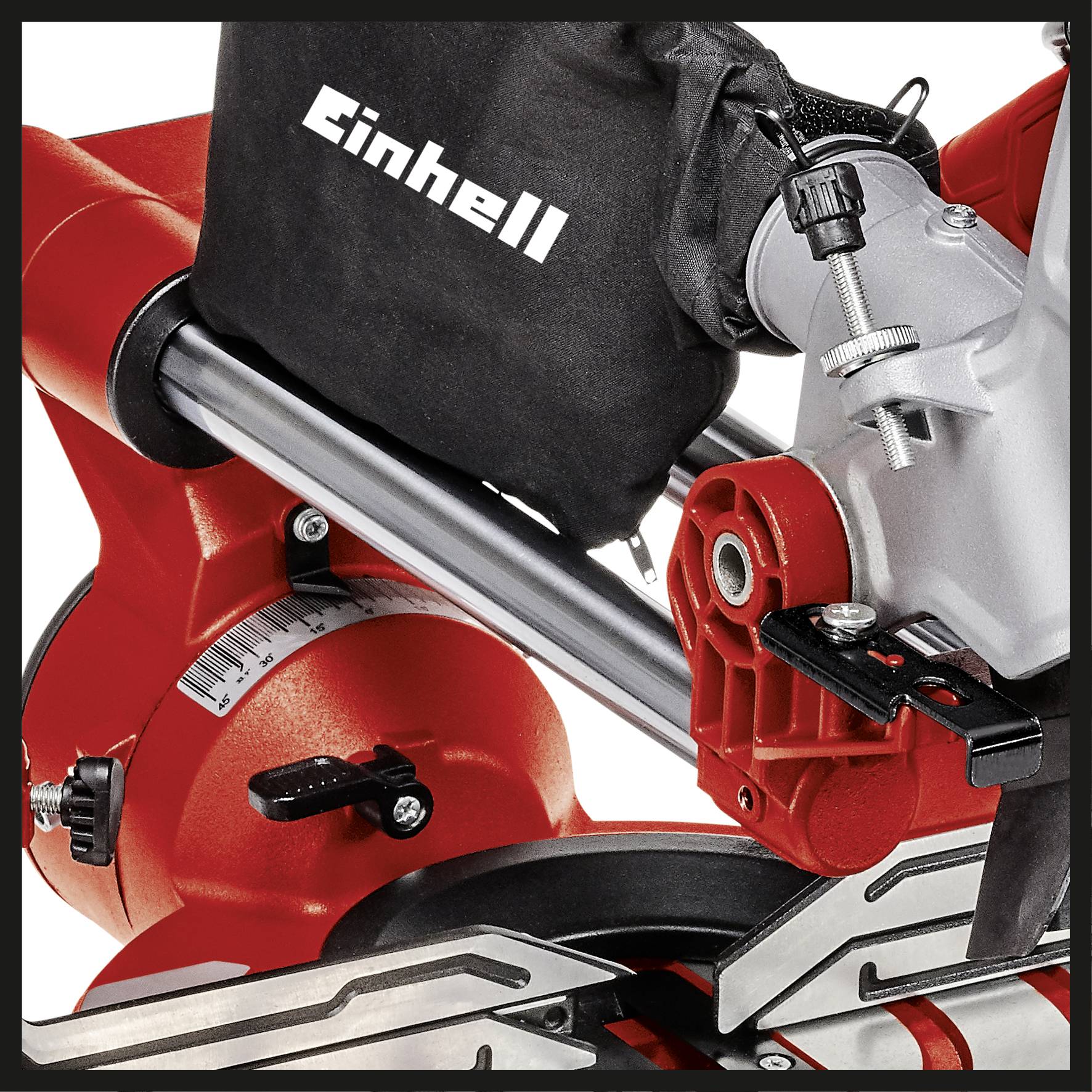 Ein rotes Elektrowerkzeug mit dem Logo 'Einhell' auf einem schwarzen Stoffbezug. Es handelt sich um eine Metall-Sägemaschine.
