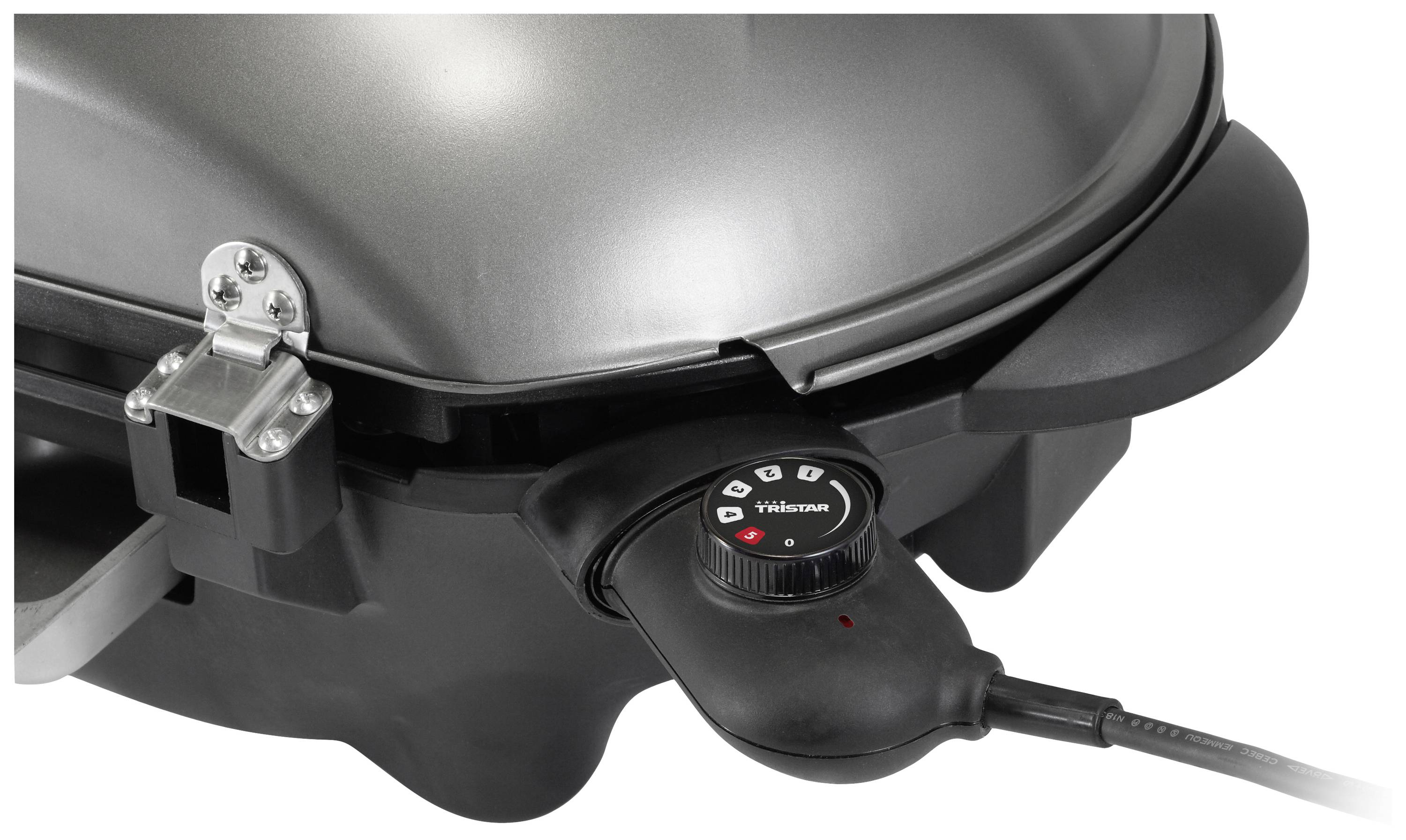 Ein elektrischer Grill mit Kontrollknopf zur Temperatureinstellung, silbernes Gehäuse, Anschlusskabel sichtbar. Ideal für Indoor-Grillen.