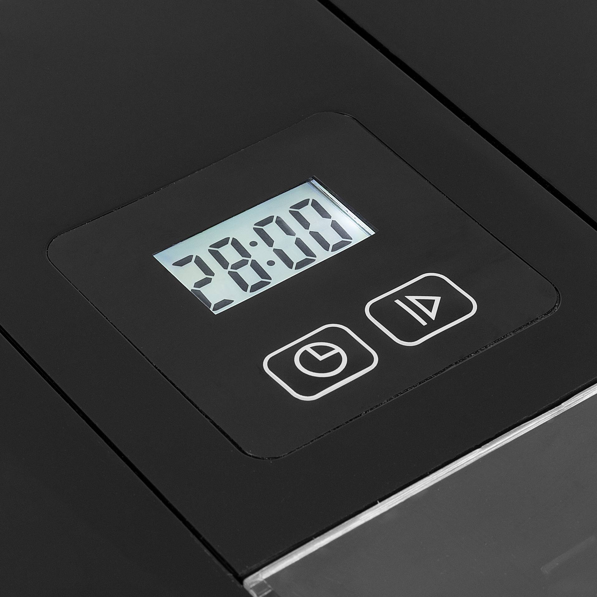 Ein digitales Display mit der Anzeige '28:00'. Darunter sind zwei Symbole: ein Kreis mit einem Pfeil und ein Dreieck.