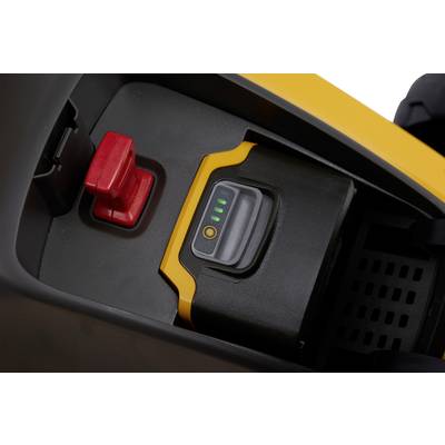 'Batteriefach mit Ladesymbol und vier grünen LEDs auf einem Gerät. Daneben befindet sich ein roter Hebel.'