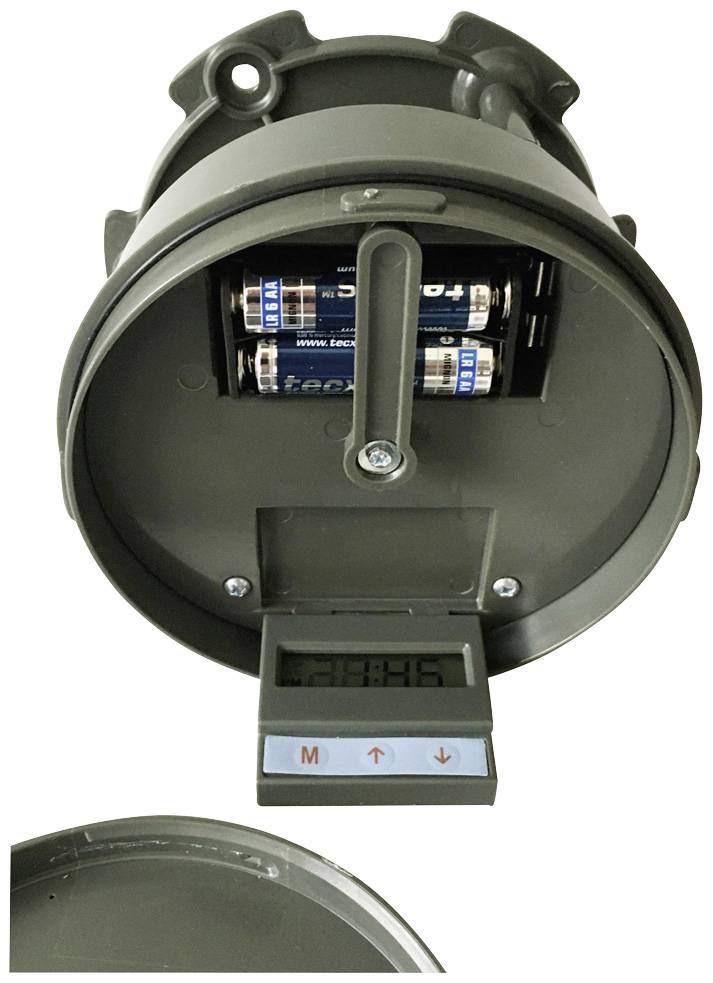 Zylinderförmiger elektronischer Timer mit digitalem Display. Batterien sichtbar, Pfeile und M-Taste erkennbar.